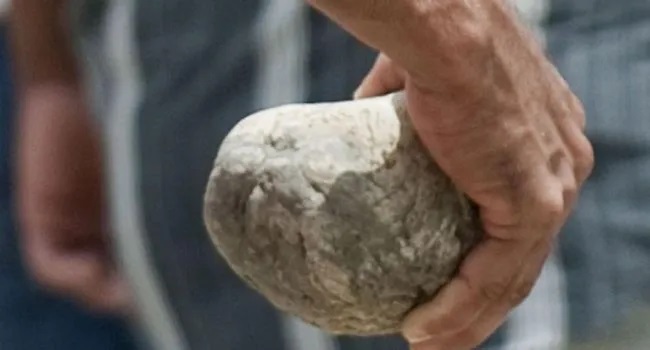 sentenced three men to death by stoning