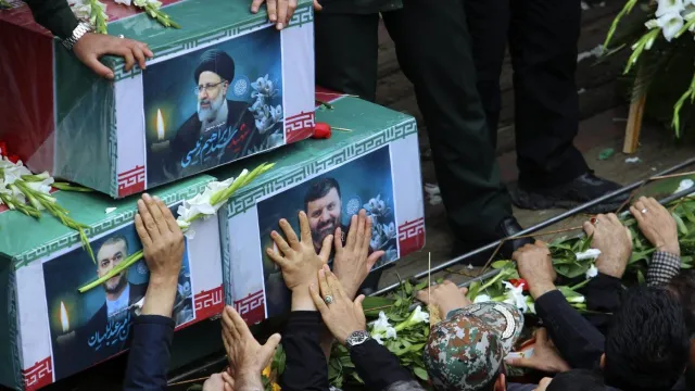 Funerals Begin For Iran President,