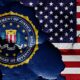 flag of FBI and USA painted on cracked wall
